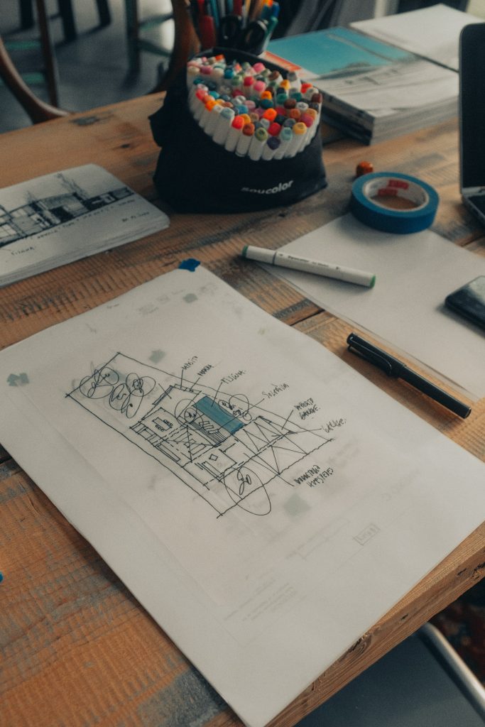 Design sketches and wireframes on paper for a portfolio