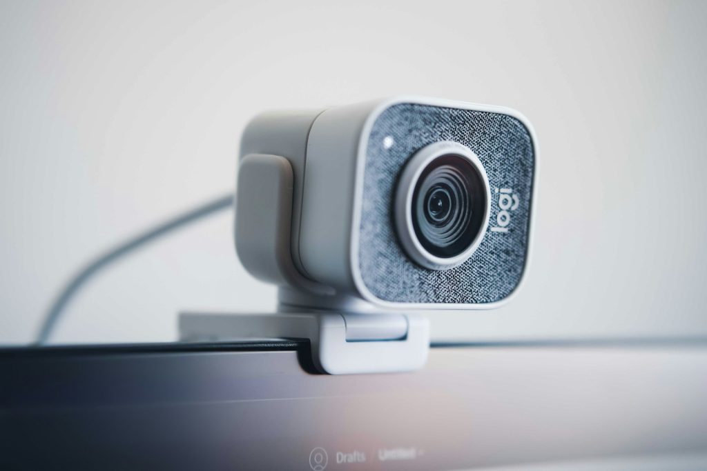 Webcam on a desk for recording online lessons