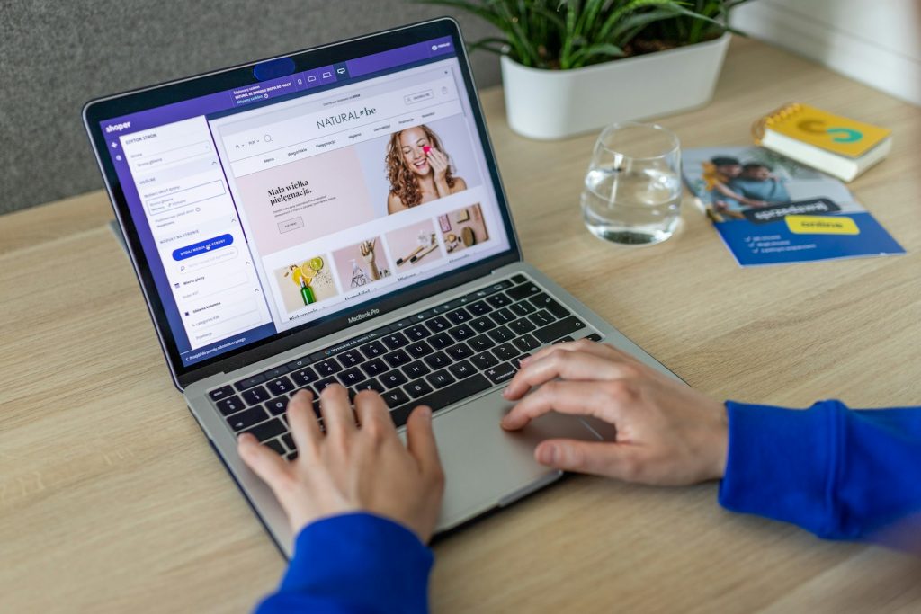 Freelancer creating an online service listing on a laptop