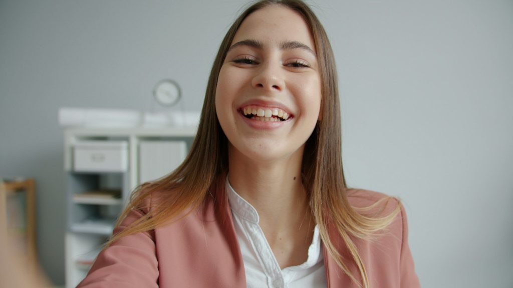 Smiling client on a video call