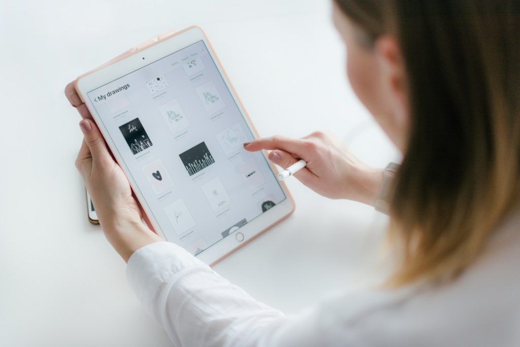 Woman reading a digital document on a tablet